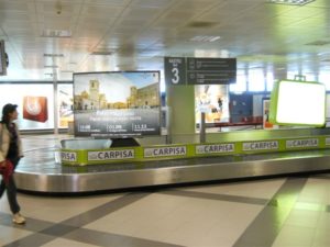 Banner pubblicitario Palazzo Adriano all'aeroporto Falcone Borsellino di Palermo